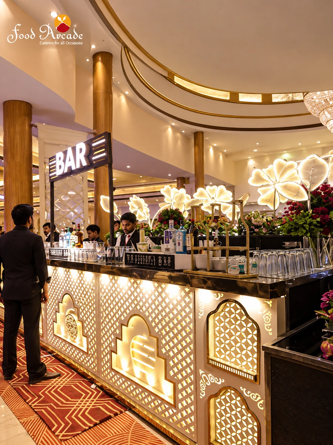 Illuminated lattice-fronted bar counter with a BAR sign and glowing flower lamps in a grand hall